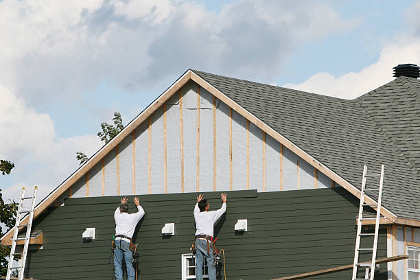 Professional Siding Replacement technician working in Staley, NC